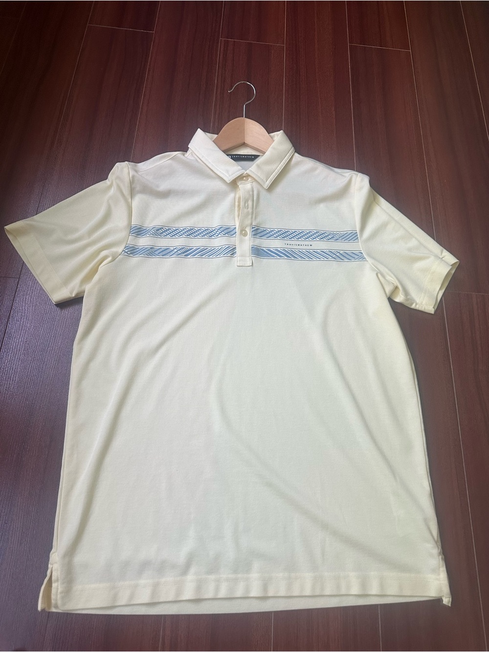 Travis Mathew Cream Polo with Light Blue Stripe